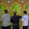 غبارروبی قنادان از ضریح حرم حضرت فاطمه معصومه سلام الله علیها